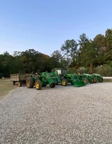 John Deere tractors lined up for hayrides