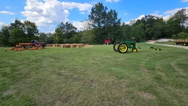 John Deere tractor in an open field